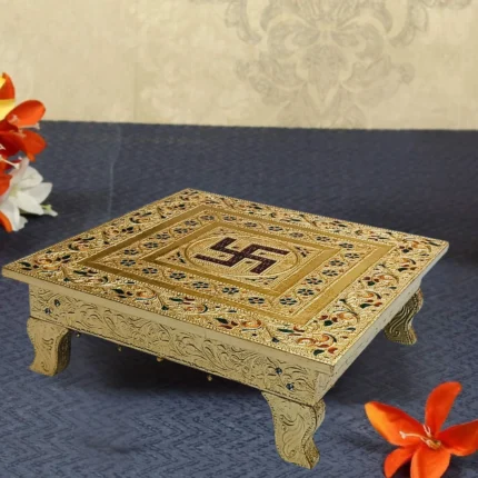 Golden Metal Coated Wooden Chowki with Swastik Design, Mina Work, and Lamination
